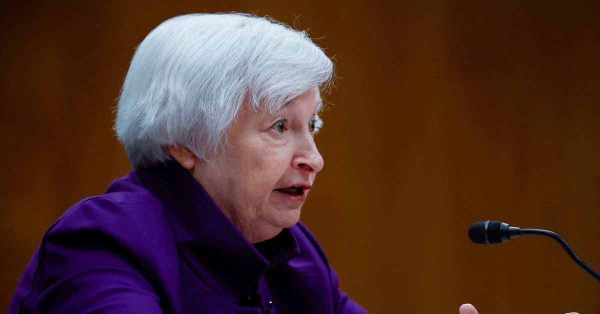 Yellen tries to assuage trader fears as lender stocks slide